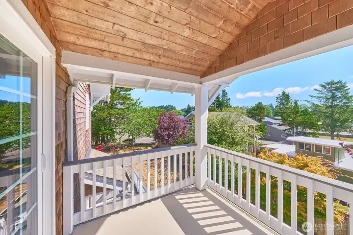 You'll enjoy watching the comings and goings of small town life from this deck.