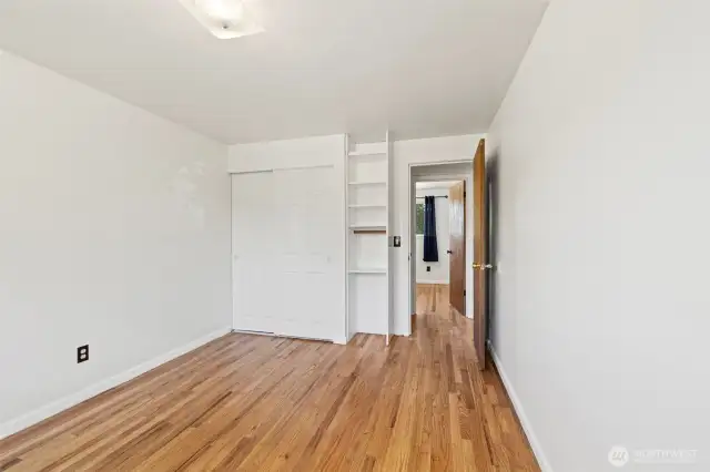 Closet with shelving in 2nd bedroom.
