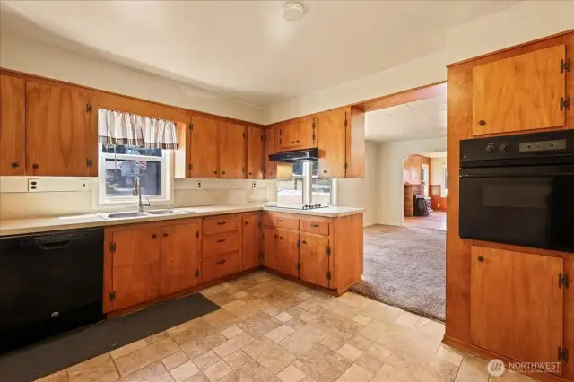 Plenty of cupboard space in this over-sized kitchen.