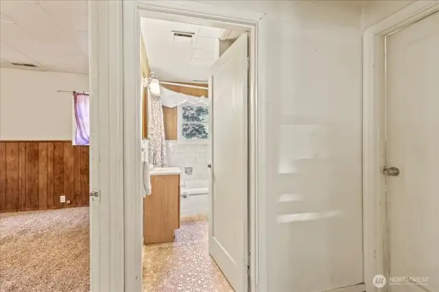 Bath entry off of living area located between bedroom 2 & 3.