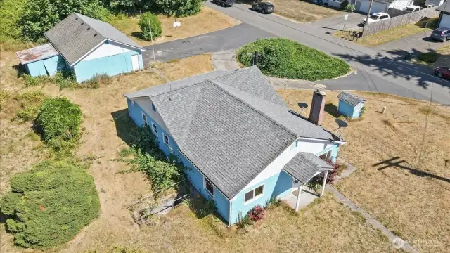 Drone photo of the house and shop.