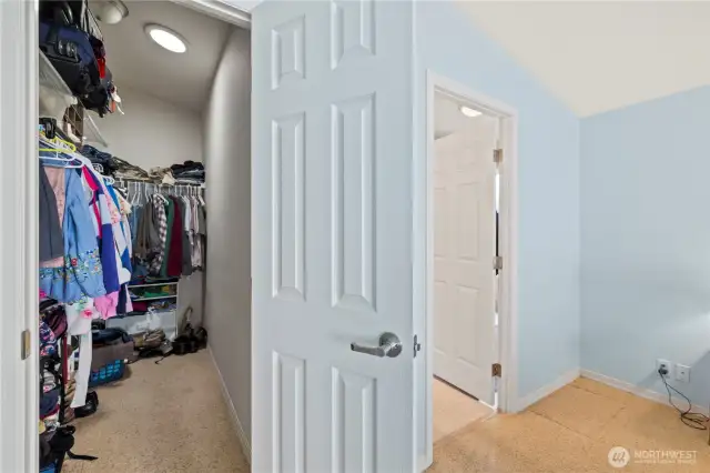 Walk-in closet in primary bath