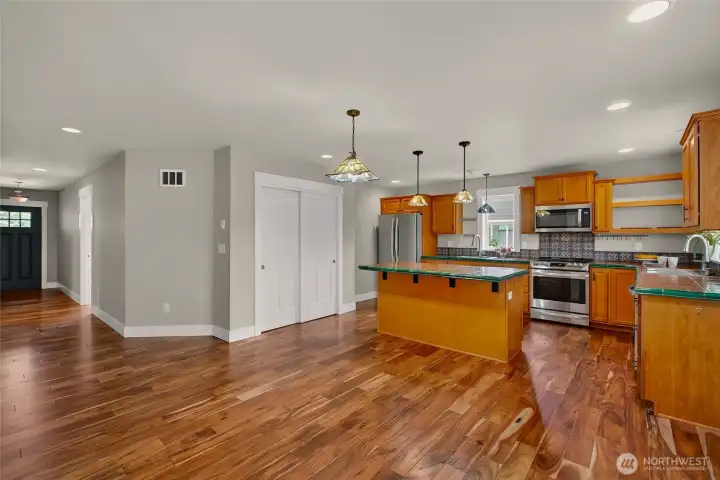 Large kitchen storage pantry to left of island. Front door down hall