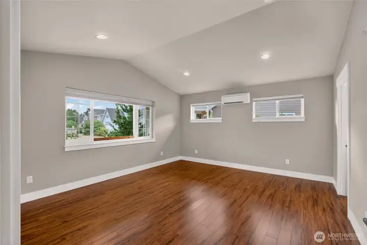 Large primary bedroom faces to the front covered porch