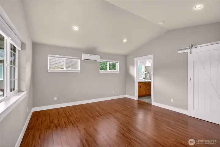 Primary bedroom w/mini split and ensuite bath.