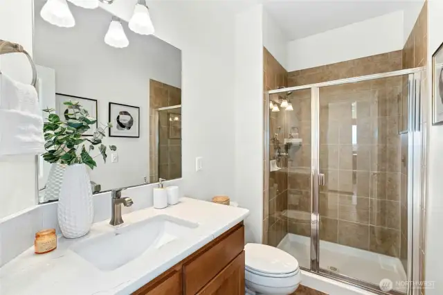 This downstairs bathroom is adjacent to the bedroom, making for perfect guest quarters!