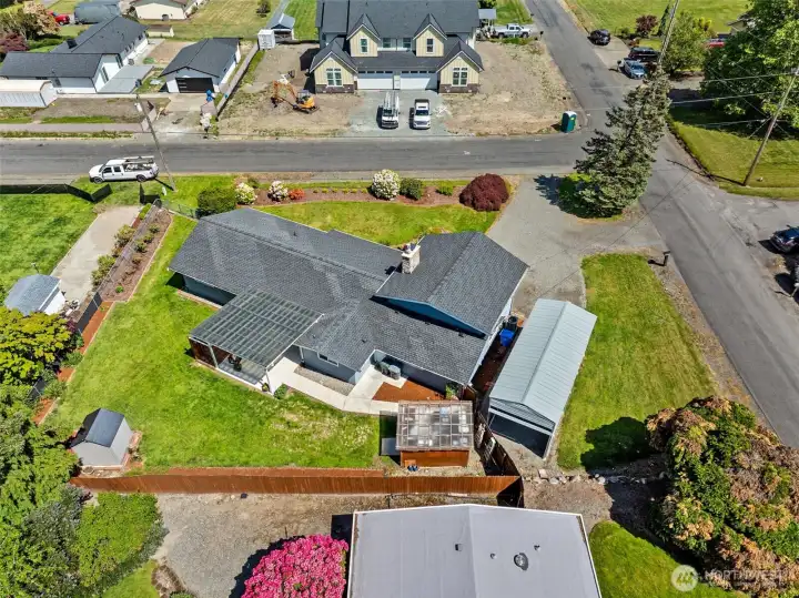 Two detached storage sheds, a fully fenced yard, covered awing & a huge RV carport. Wow!