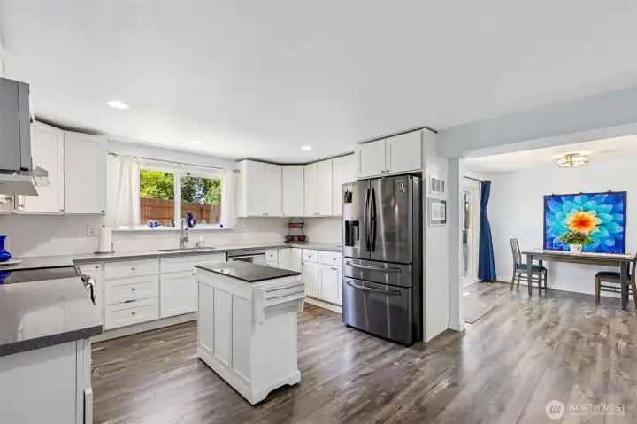 Quartz counters & stainless appliances.