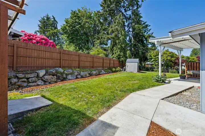 Large & fully fenced yard.