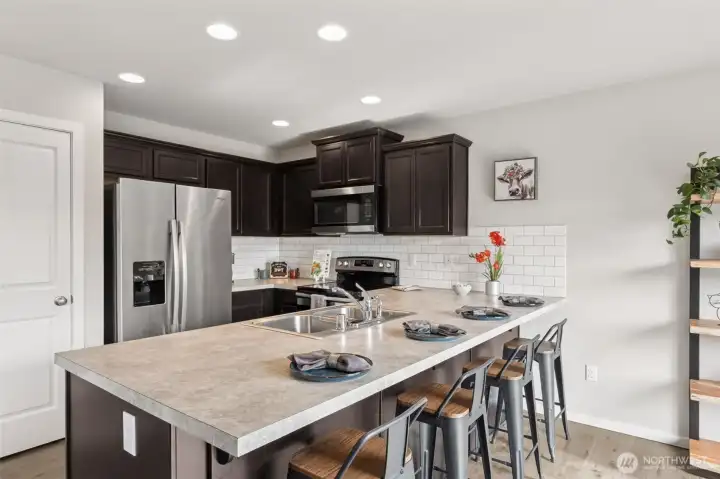 Kitchen with Large Breakfast Bar & Pantry