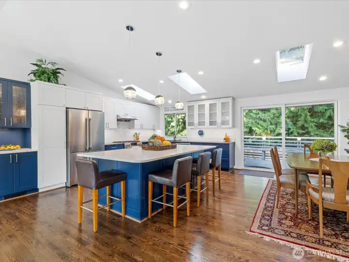 Beautifully Updated with Modern Finishes, Quartz Countertops, Stainless Steel Appliances & Gas Cooking.