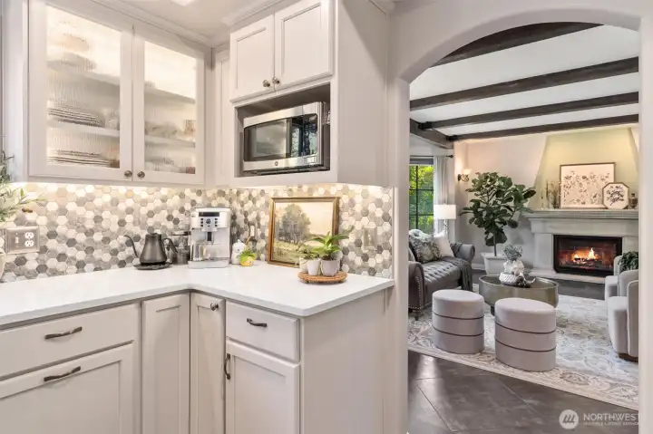 Step through the arched doorways into your bright & updated kitchen.
