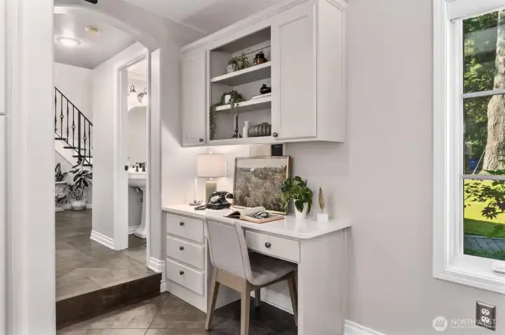 With convenient workstation, storage cabinets and built in desk.