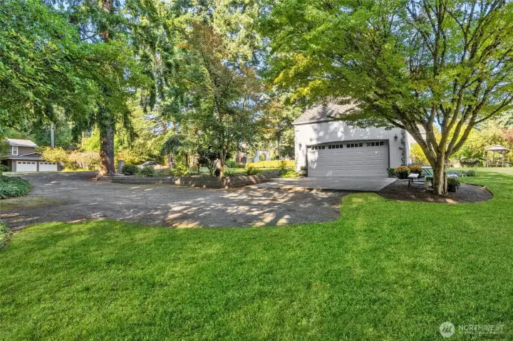 Spacious 2 car garage and large driveway holds much potential!
