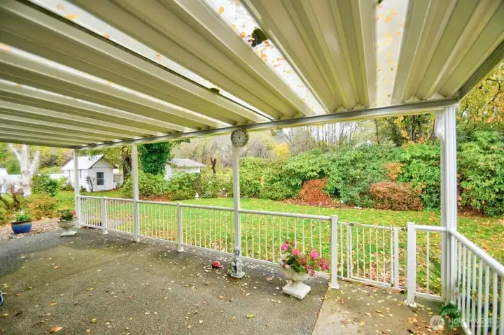 Large covered patio with private wooded setting