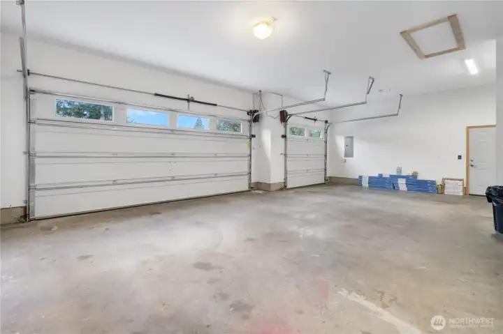 3-car fully finished garage with enhanced security garage door openers