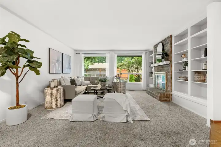 Oversized windows in living room overlooking private back yard