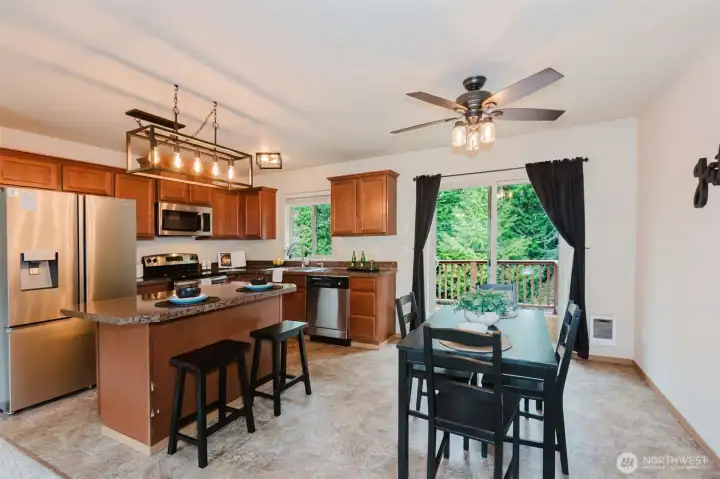 Kitchen with island and dining room