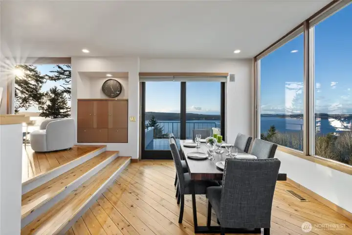 Dining room open to the living room & one of the 3 the viewing decks.