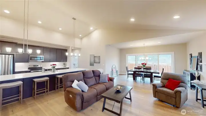 A large dining area is adjacent the living room and dining room.