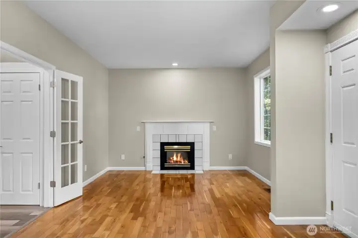 Other side of the living room showing the gas fireplace.