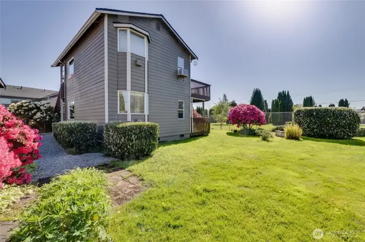 The Home is Unit on the Bottom Level ~ Surrounded by Beautiful Grounds & Plenty of Privacy!