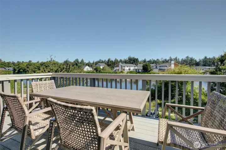 Enjoy the morning sunrises and evening breezes from your private deck off of the primary suite. Such a serene setting!