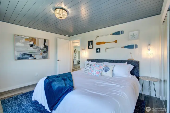 The second bedroom of Unit A is also comfortable appointed in a beach theme.