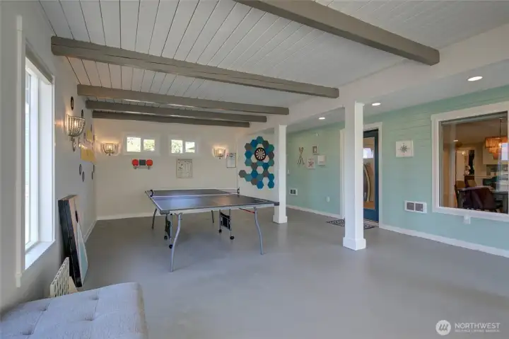 Moving down to the main level, you enter Unit B in the Game Room!!!!