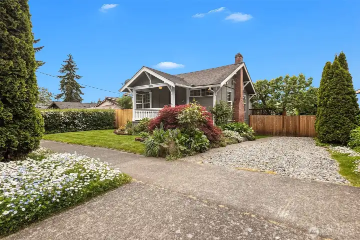 Large area for parking along the incredible front garden space.