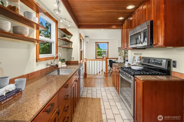 Kitchen is at the heart of the home connecting living areas and brims with light.