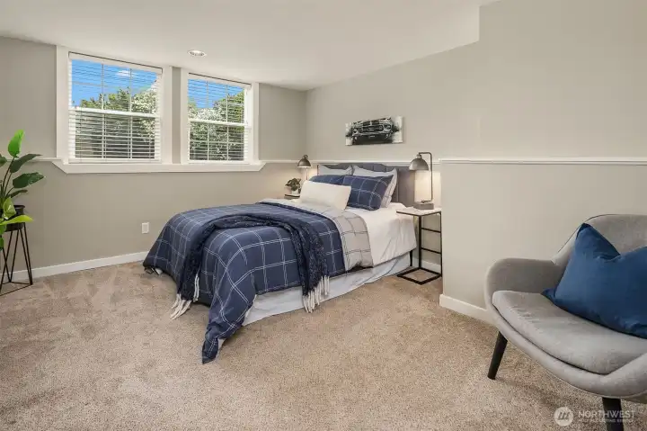 This large lower level bedroom wtih a big closet works well as a primary too!