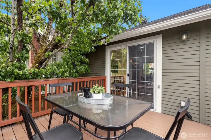 Generous deck overlooking a very well maintained garden. BBQ season is here!