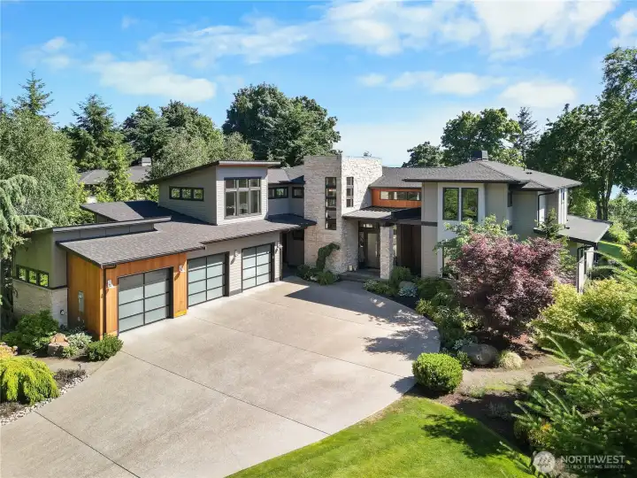 A masterclass in luxury curb appeal, welcome to Fox Island!