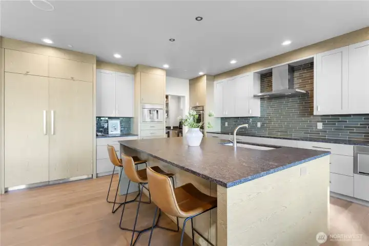 From the custom cabinetry to the professional range, every detail has been curated for a world-class cooking experience.