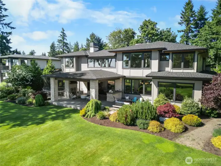 This vantage point highlights the masterful integration of glass, stone, and wood that defines this premier residence.