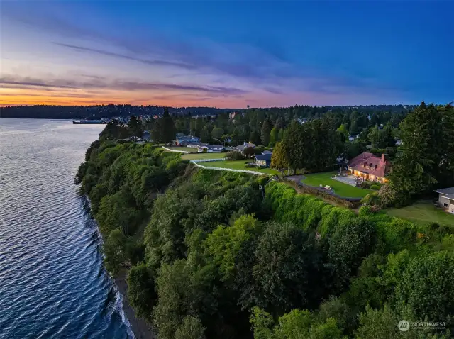 Welcome to timeless charm with this beautiful Puget Sound property overlooking a breathtaking kaleidoscope of Pacific Northwest views.