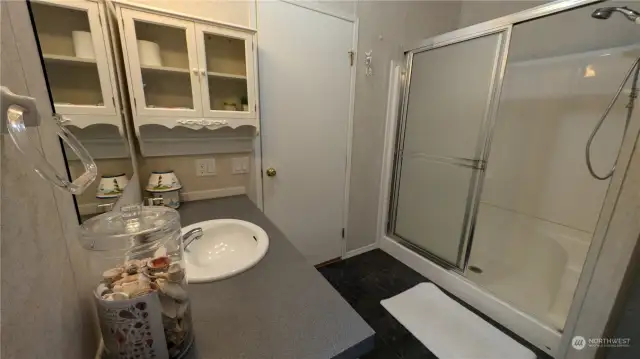 Ensuite .75 bathroom with spacious shower.