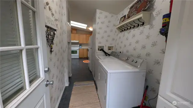 Back door leads into laundry room and kitchen.