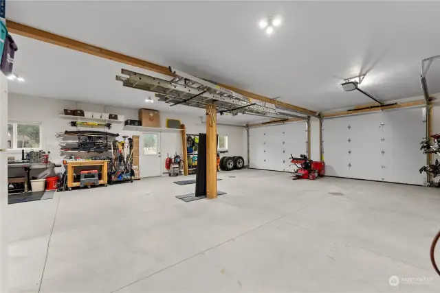 1200 sf Garage and Shop aims to please with a place for every tool and toy! Slab on grade concrete floor french drain. Finished and insulated. 4 vehicle capacity.