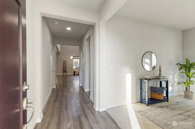 Bright entry beautiful floors. Office/Living Space to the right