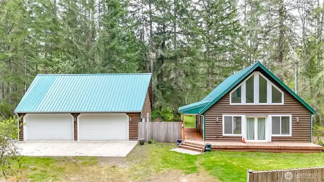 Cabin in the woods with detached 4 car garage