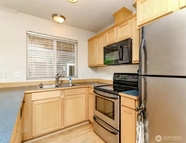 Kitchen with maple cabinets