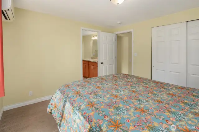 Spacious primary bedroom with bath