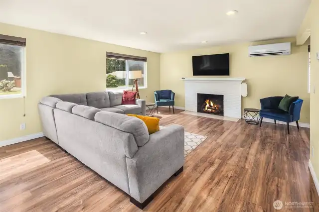 Spacious living room with cozy fireplace