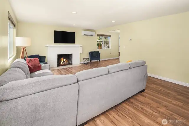 Spacious living room with cozy fireplace