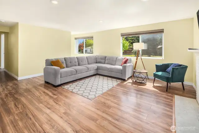 Spacious living room with cozy fireplace