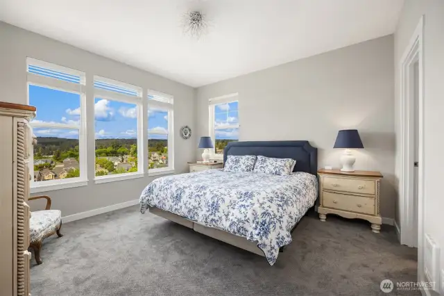 The lovely primary suite provides a peaceful haven.