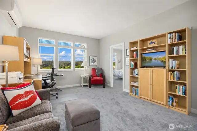 The upper floor family room makes a great place for reading, writing or watching a movie.