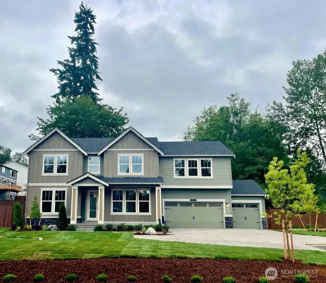 Photo is of actual home under construction. See site agent for details. Large driveway and 3-car garage! Large, private, corner lot!